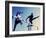 Low Angle View of Athletes Jumping over Hurdles-null-Framed Photographic Print