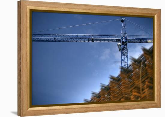 Low Angle View of Crane on Construction Site-David Barbour-Framed Stretched Canvas
