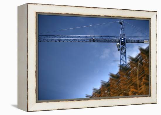 Low Angle View of Crane on Construction Site-David Barbour-Framed Stretched Canvas