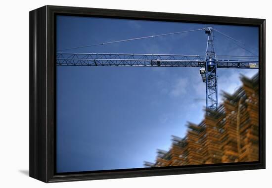 Low Angle View of Crane on Construction Site-David Barbour-Framed Stretched Canvas