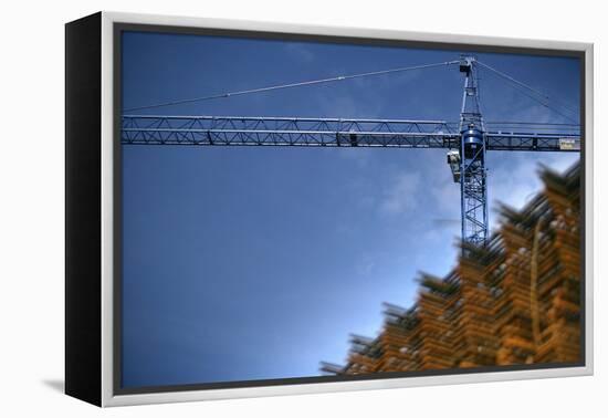 Low Angle View of Crane on Construction Site-David Barbour-Framed Stretched Canvas