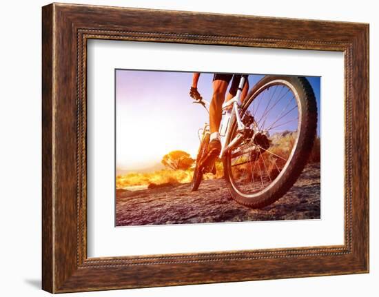 Low Angle View Of Cyclist Riding Mountain Bike On Rocky Trail At Sunrise-warrengoldswain-Framed Photographic Print