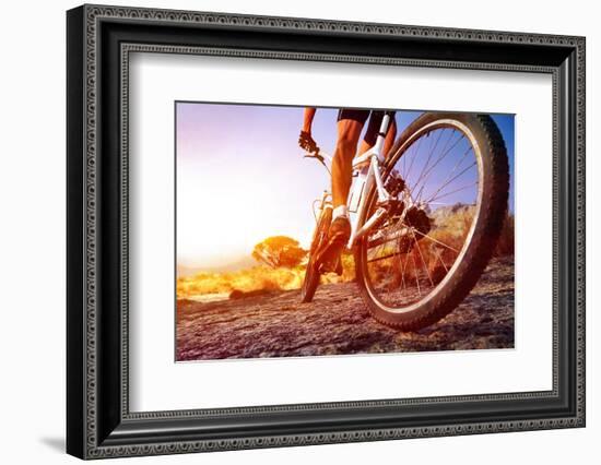 Low Angle View Of Cyclist Riding Mountain Bike On Rocky Trail At Sunrise-warrengoldswain-Framed Photographic Print