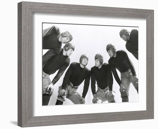 Low Angle View of Football Huddle-Everett Collection-Framed Photographic Print