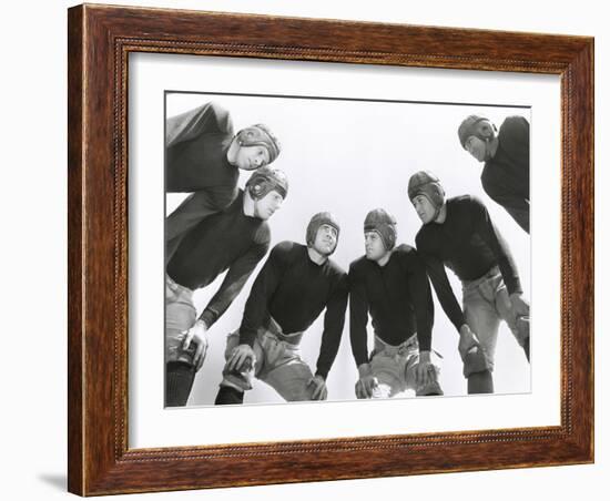 Low Angle View of Football Huddle-Everett Collection-Framed Photographic Print