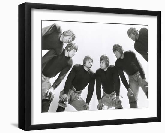 Low Angle View of Football Huddle-Everett Collection-Framed Photographic Print