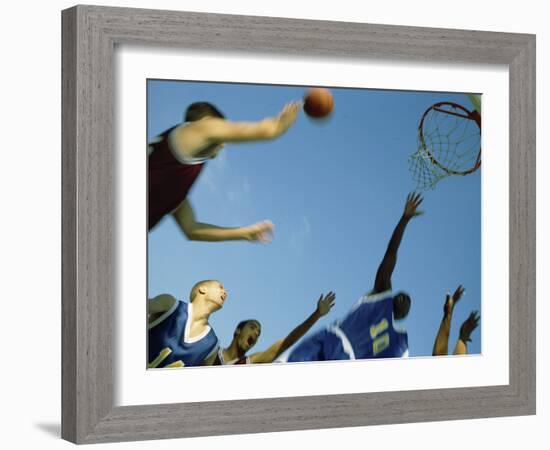 Low Angle View of Group of Young Men Playing Basketball-null-Framed Photographic Print