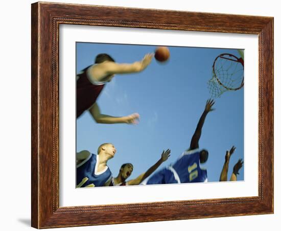 Low Angle View of Group of Young Men Playing Basketball-null-Framed Photographic Print