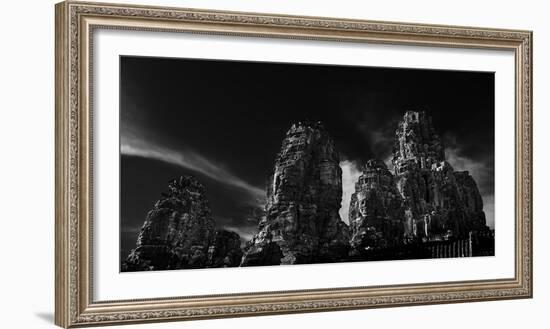 Low angle view of ruins of carved stone faces in temple, Serenity of the Stone Faces, Prasat Bay...-Panoramic Images-Framed Photographic Print