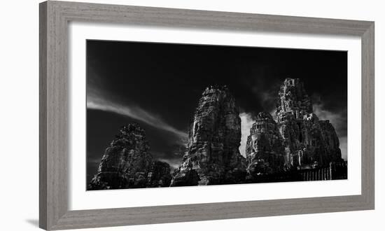 Low angle view of ruins of carved stone faces in temple, Serenity of the Stone Faces, Prasat Bay...-Panoramic Images-Framed Photographic Print