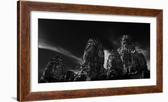 Low angle view of ruins of carved stone faces in temple, Serenity of the Stone Faces, Prasat Bay...-Panoramic Images-Framed Photographic Print