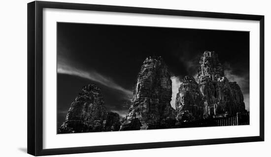 Low angle view of ruins of carved stone faces in temple, Serenity of the Stone Faces, Prasat Bay...-Panoramic Images-Framed Photographic Print