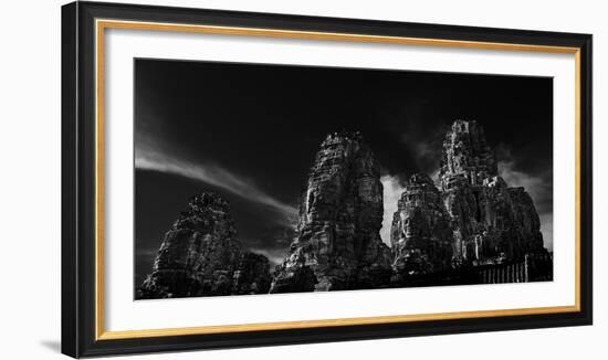 Low angle view of ruins of carved stone faces in temple, Serenity of the Stone Faces, Prasat Bay...-Panoramic Images-Framed Photographic Print