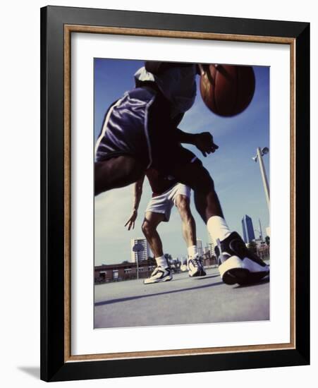 Low Angle View of Two Men Playing Basketball-null-Framed Photographic Print