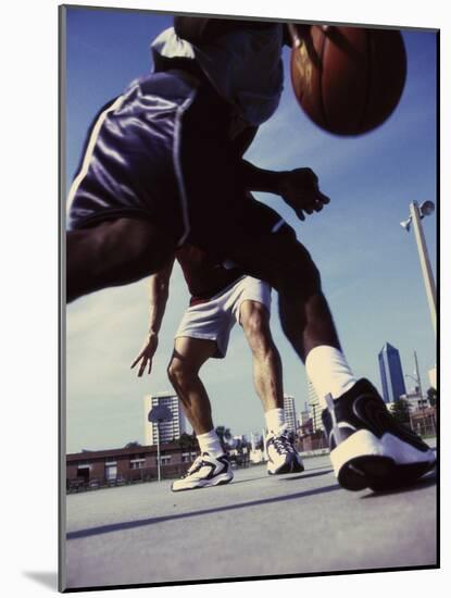 Low Angle View of Two Men Playing Basketball-null-Mounted Photographic Print