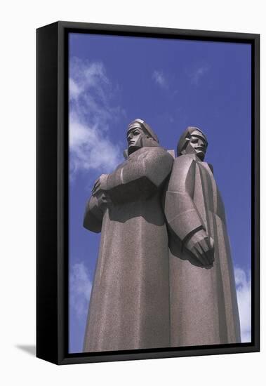 Low Angle View of Two Statues, Red Latvian Riflemen, Riga, Latvia-null-Framed Premier Image Canvas