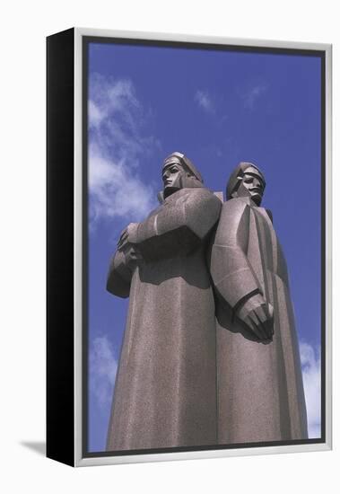 Low Angle View of Two Statues, Red Latvian Riflemen, Riga, Latvia-null-Framed Premier Image Canvas