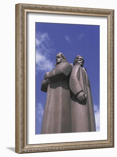 Low Angle View of Two Statues, Red Latvian Riflemen, Riga, Latvia-null-Framed Giclee Print