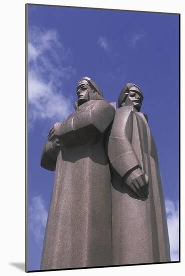 Low Angle View of Two Statues, Red Latvian Riflemen, Riga, Latvia-null-Mounted Giclee Print