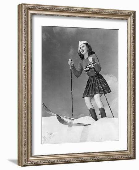 Low Angle View of Young Woman Skiing-null-Framed Photo