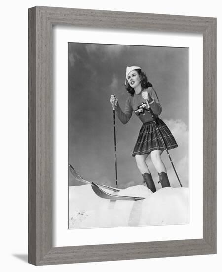 Low Angle View of Young Woman Skiing-null-Framed Photo