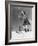 Low Angle View of Young Woman Skiing-null-Framed Photo