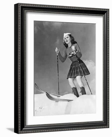 Low Angle View of Young Woman Skiing-null-Framed Photo