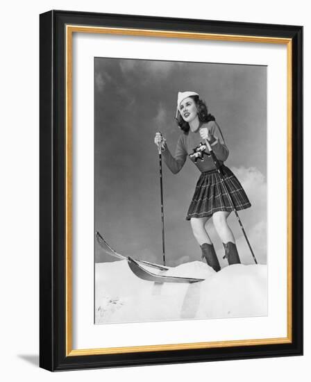 Low Angle View of Young Woman Skiing-null-Framed Photo