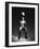 Low Section View of a Soccer Player Jumping in Mid Air to Head a Soccer Ball-null-Framed Photographic Print