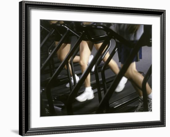 Low Section View of People Running on Treadmills in a Gym-null-Framed Photographic Print