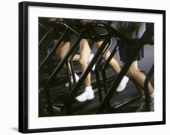 Low Section View of People Running on Treadmills in a Gym-null-Framed Photographic Print