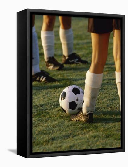 Low Section View of Soccer Players Feet and a Soccer Ball-null-Framed Premier Image Canvas