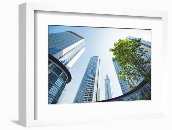 Low Wide Angle View of a Group of New Skyscrapers Combined with Fresh Greenery in Jianggan-Andreas Brandl-Framed Photographic Print