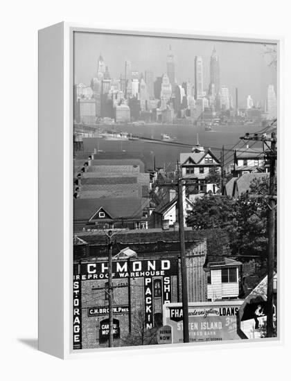 Lower Manhattan and Ferry Docks with Aid of a Telephoto Lens over the Rooftops in Staten Island-Andreas Feininger-Framed Premier Image Canvas