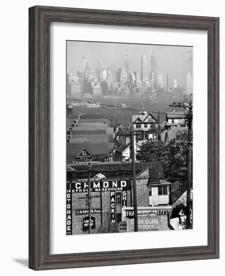 Lower Manhattan and Ferry Docks with Aid of a Telephoto Lens over the Rooftops in Staten Island-Andreas Feininger-Framed Photographic Print