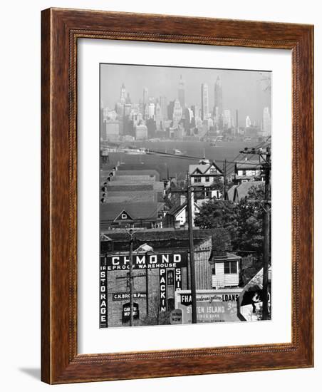 Lower Manhattan and Ferry Docks with Aid of a Telephoto Lens over the Rooftops in Staten Island-Andreas Feininger-Framed Photographic Print