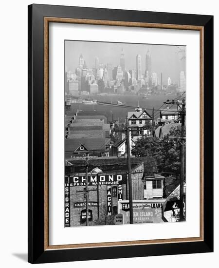 Lower Manhattan and Ferry Docks with Aid of a Telephoto Lens over the Rooftops in Staten Island-Andreas Feininger-Framed Photographic Print