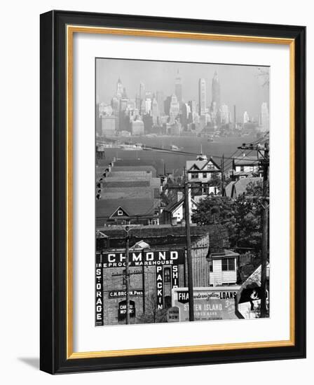 Lower Manhattan and Ferry Docks with Aid of a Telephoto Lens over the Rooftops in Staten Island-Andreas Feininger-Framed Photographic Print