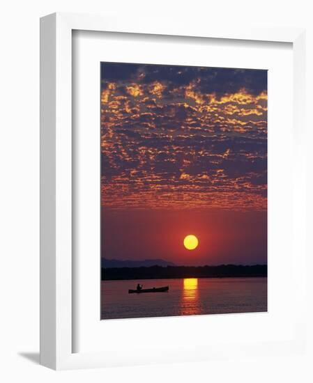 Lower Zambesi National Park, Canoeing on the Zambezi River at Sun Rise under a Mackerel Sky, Zambia-John Warburton-lee-Framed Photographic Print