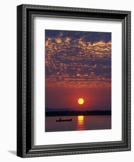 Lower Zambesi National Park, Canoeing on the Zambezi River at Sun Rise under a Mackerel Sky, Zambia-John Warburton-lee-Framed Photographic Print