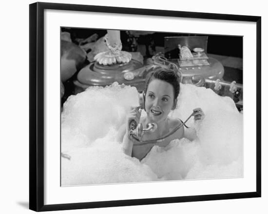 Lucille Bremer Acting in Bath Scene from "Yolanda and the Thief."-Walter Sanders-Framed Premium Photographic Print