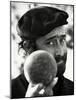 Lucio Dalla Is Holding a Bowl in His Hand-null-Mounted Photographic Print