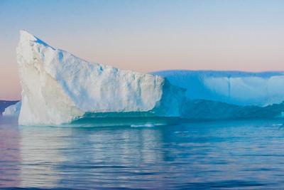 Midnight sun over Jokulsarlon iceberg available as Framed Prints