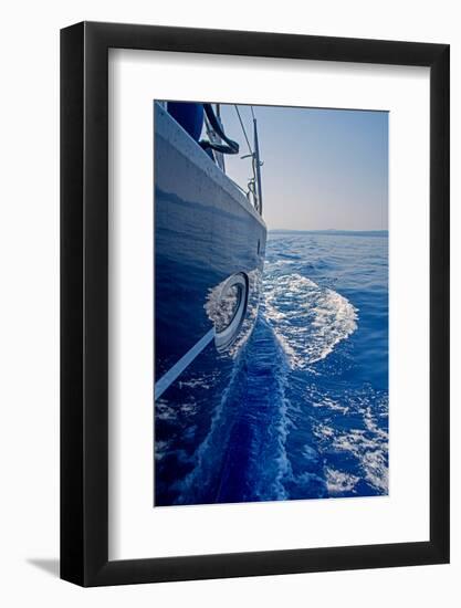 Luxury Navy Blue Sail Yacht is Sailing on High Speed in a Blue Sea with Waves Reflected in a Smooth-Artem Avetisyan-Framed Photographic Print