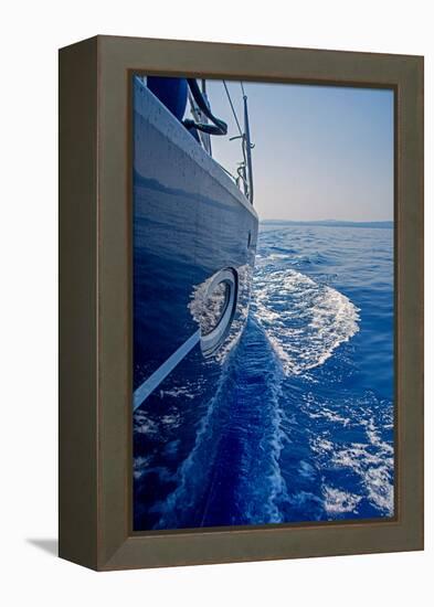 Luxury Navy Blue Sail Yacht is Sailing on High Speed in a Blue Sea with Waves Reflected in a Smooth-Artem Avetisyan-Framed Premier Image Canvas