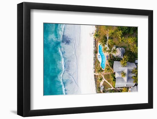 Luxury resort with swimming pool on a palm fringed beach, aerial view, Zanzibar, Tanzania-Roberto Moiola-Framed Photographic Print