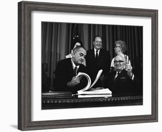 Lyndon Johnson Signing the Medicare Bill with Former President Truman, July 7,1965-null-Framed Photo