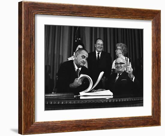 Lyndon Johnson Signing the Medicare Bill with Former President Truman, July 7,1965-null-Framed Photo