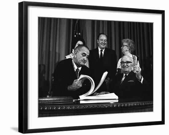 Lyndon Johnson Signing the Medicare Bill with Former President Truman, July 7,1965-null-Framed Photo
