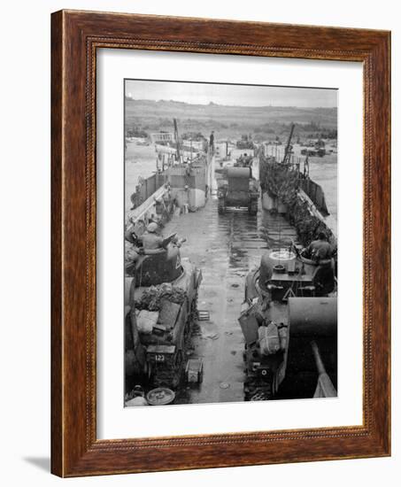 M4 Sherman Tanks with Exhaust Stacks Driving Off a Landing Craft Towards a Beach-null-Framed Photographic Print